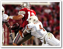 Drew Kelson forces OSU QB Justin Zwick to fumble the football.