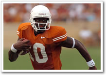 Vince Young carries the football