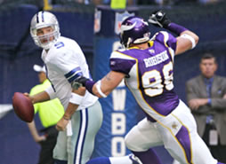 Brian Robison chases down Tony Romo