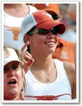 Texas softball pitcher Cat Osterman roots on the baseball team