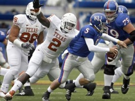 Sergio Kindle and the Texas defense will make Todd Reesing run for his life.